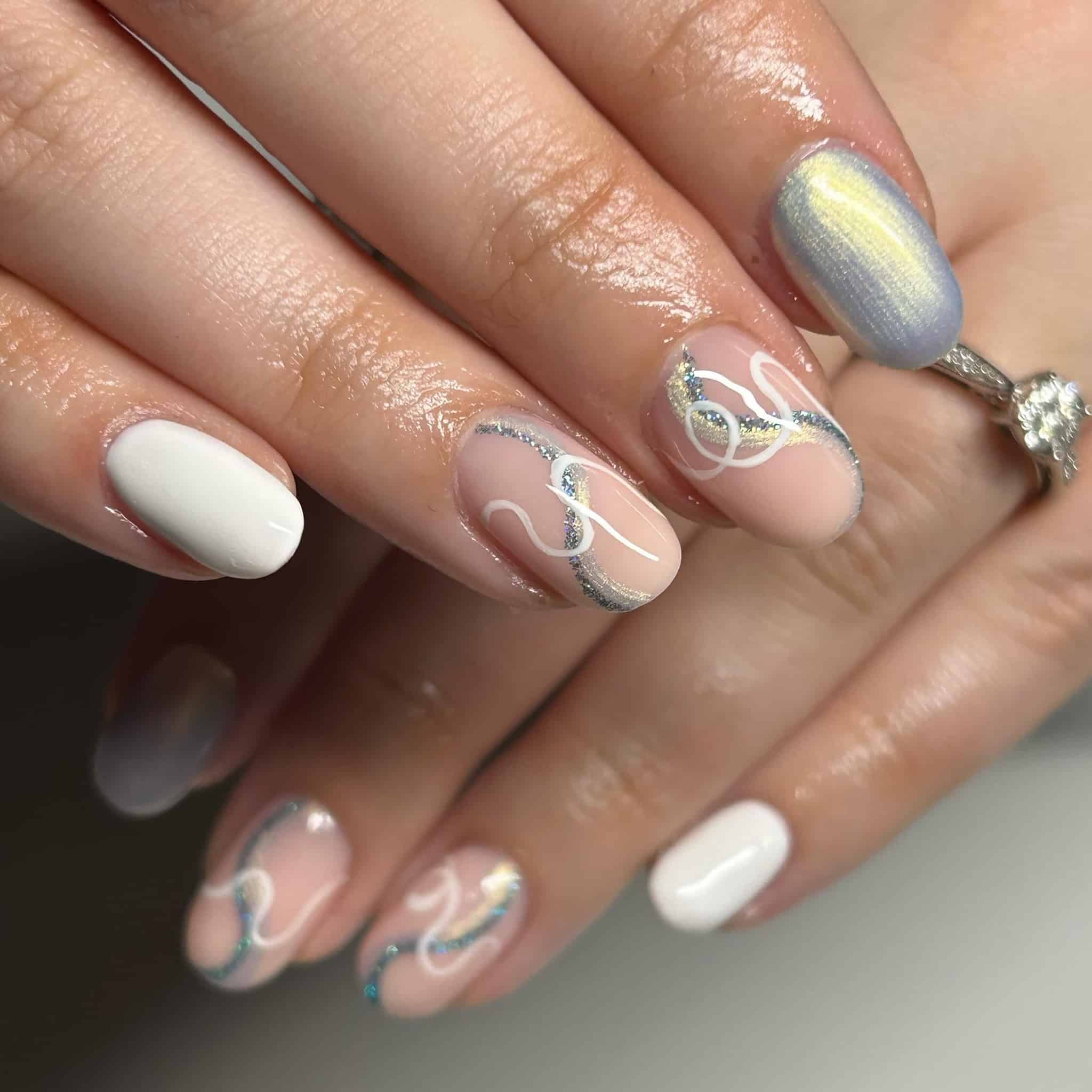 17. Short Nude Nails with Iridescent Glitter Tips - simple sparkly nail ideas