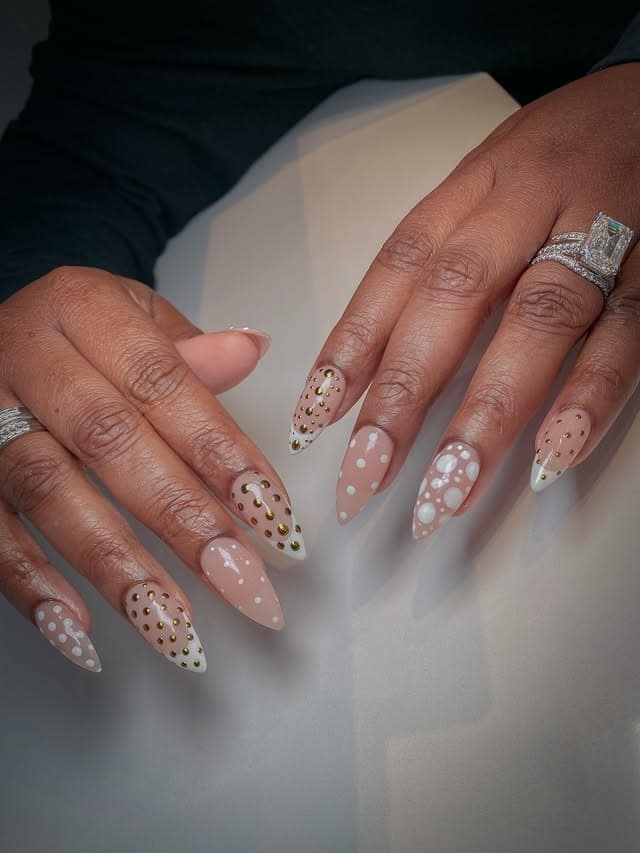1. Nude Almond Stiletto with Gold Studs and White Dots - simple stiletto nail ideas