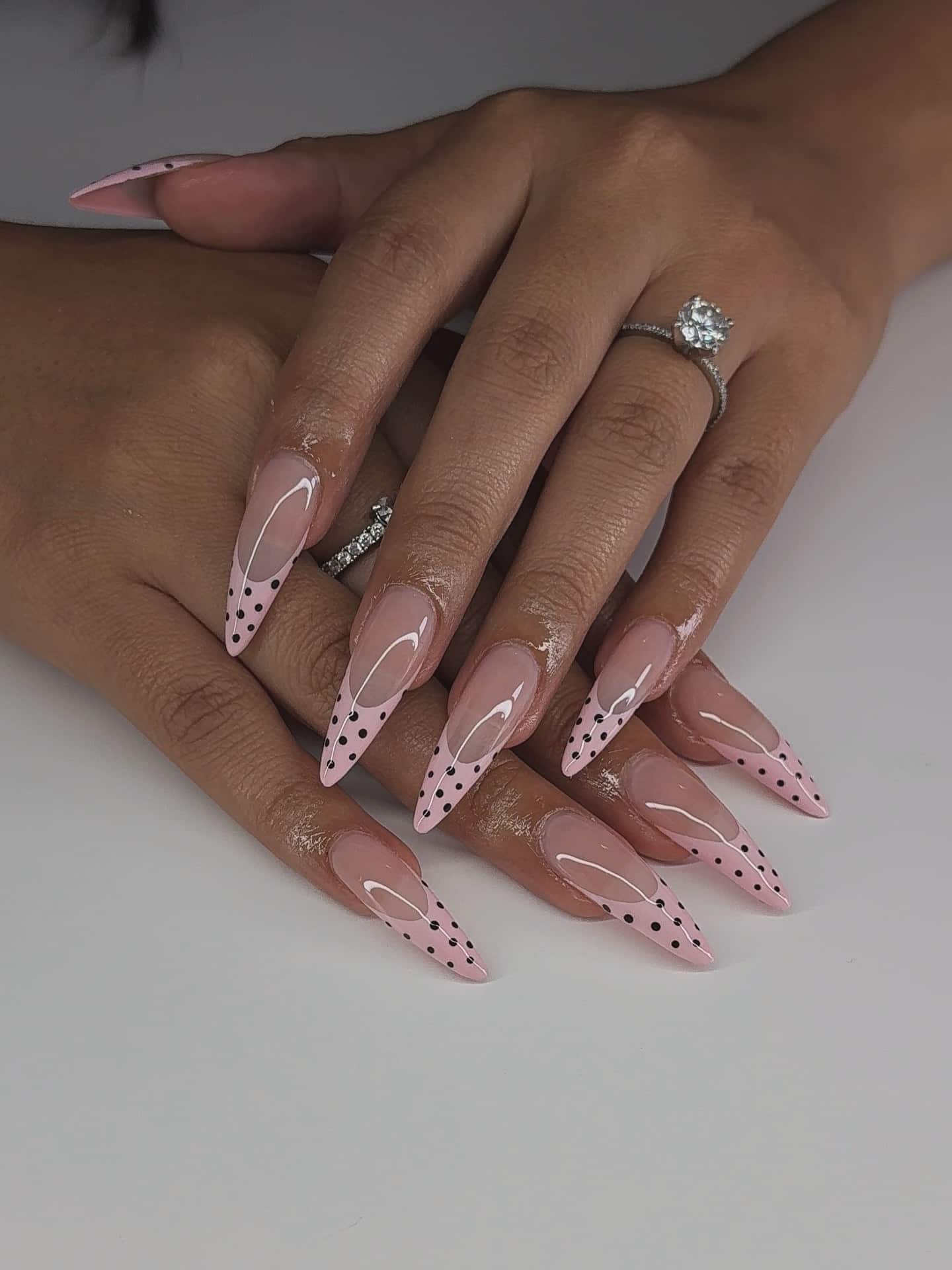 4. Blush Pink French Tip Stiletto with Black Polka Dots - simple stiletto nail ideas