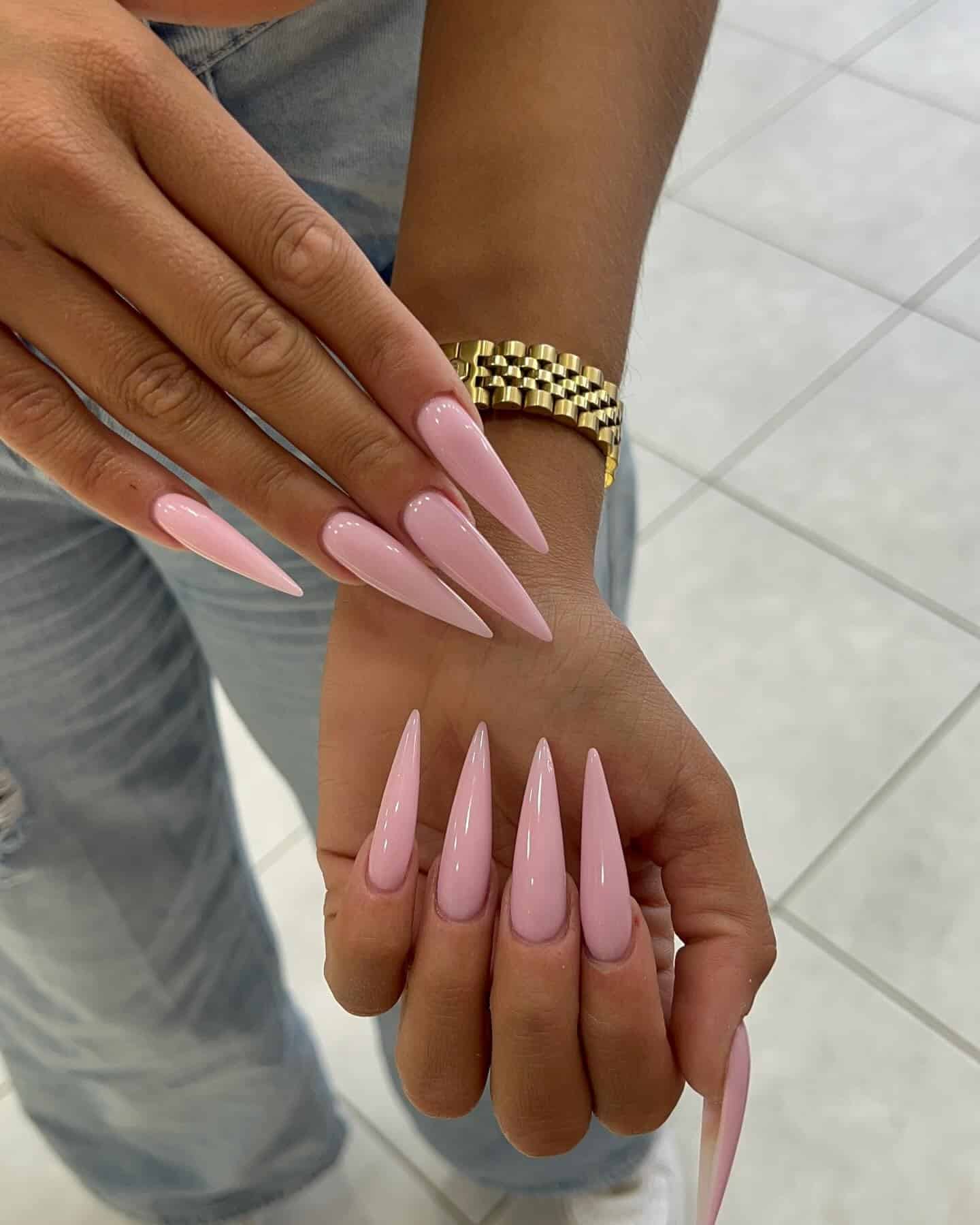10. Glossy Soft Pink Classic Stiletto Nails - simple stiletto nail ideas