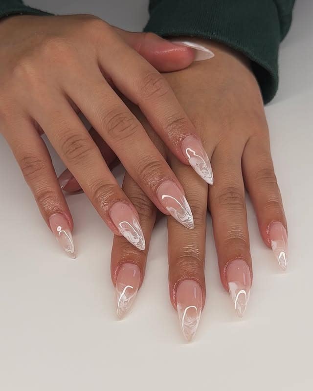18. Milky Nude Stiletto with White Swirl Detailing - simple stiletto nail ideas