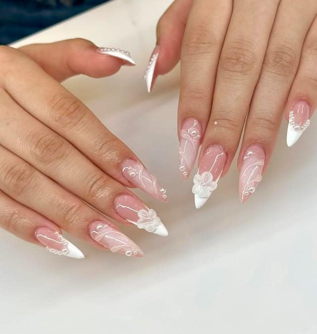 19. Sheer Pink Stiletto with White Floral Embellishments - simple stiletto nail ideas