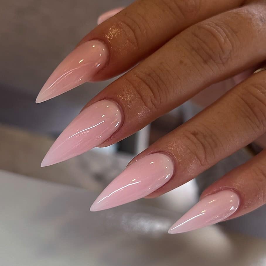 22. Soft Baby Pink Glossy Stiletto Nails - simple stiletto nail ideas