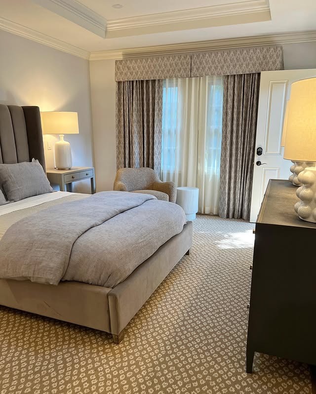 15. Layered Cream and Beige Draped Bedroom with Patterned Textiles - cream color bedroom ideas