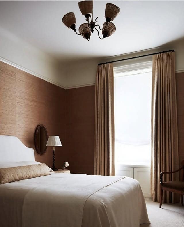 18. Warm Cream and Terracotta Wall Bedroom with Natural Textures - cream color bedroom ideas