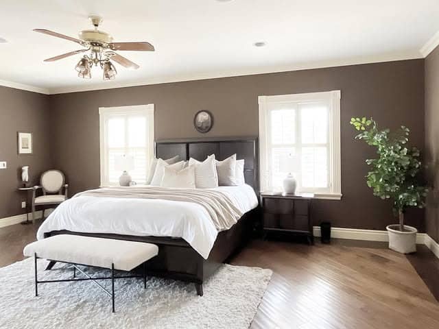 19. Classic Cream Bedroom with Deep Brown Contrast Walls - cream color bedroom ideas