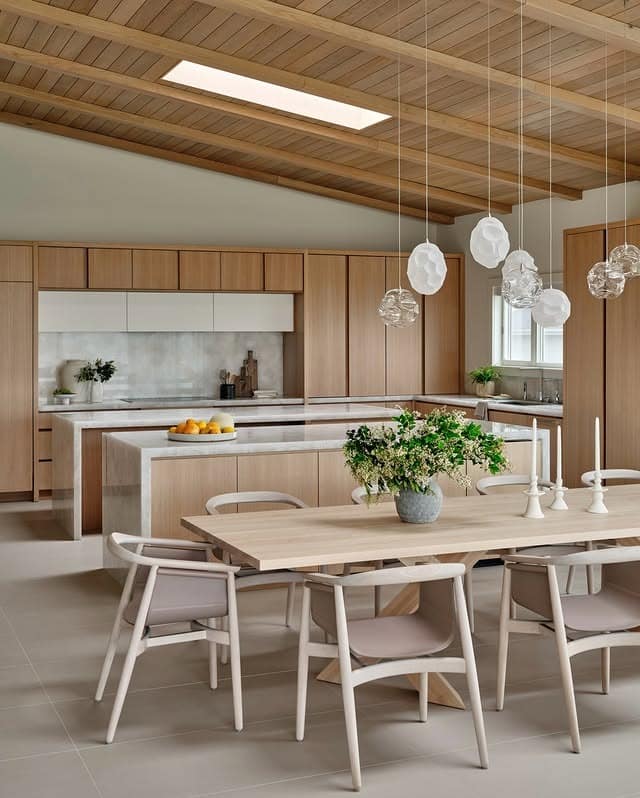 4. Scandinavian-Inspired Long Kitchen with Light Wood Finishes - long kitchen ideas