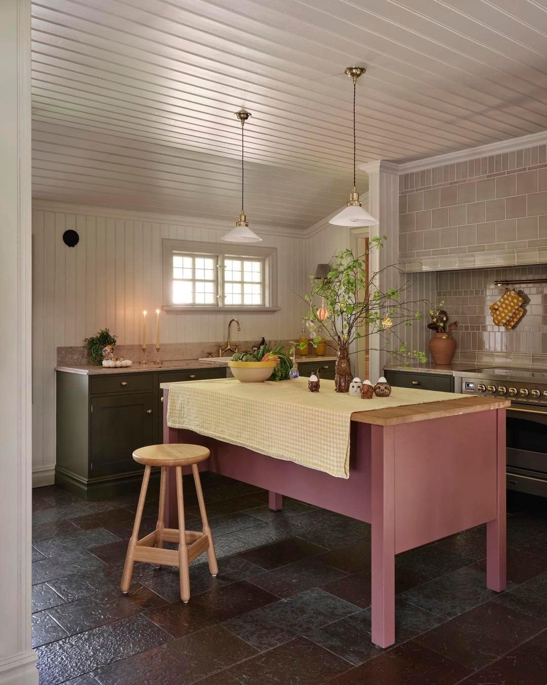 5. Cottage-Style Kitchen with Painted Island and Classic Paneling - long kitchen ideas