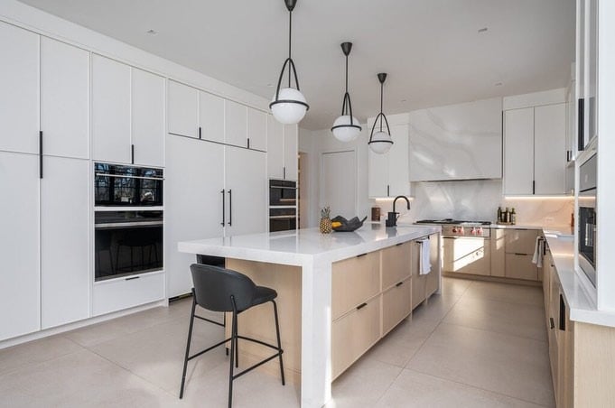16. Minimalist White Long Kitchen with Integrated Storage - long kitchen ideas