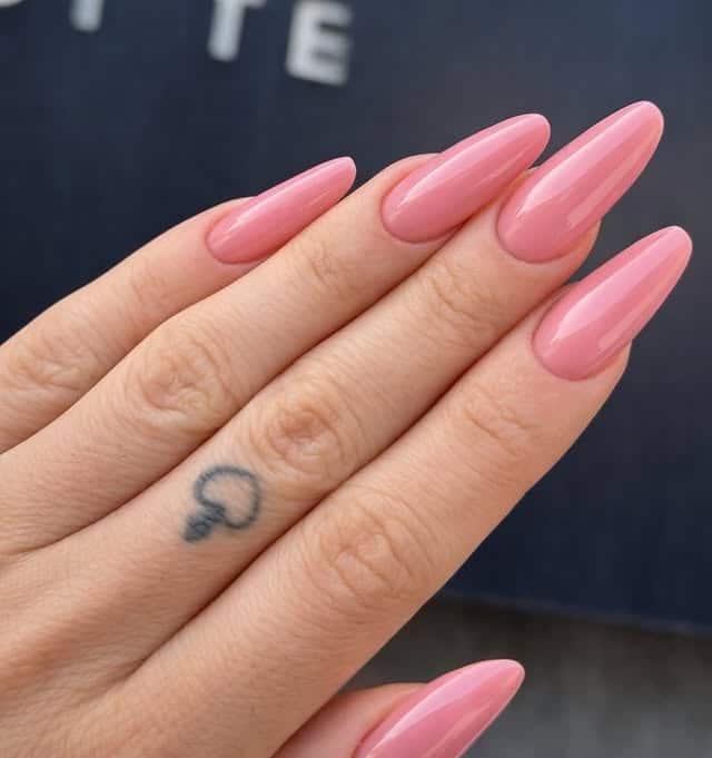 2. Classic High-Gloss Pink Almond Nails - soft pink nail ideas