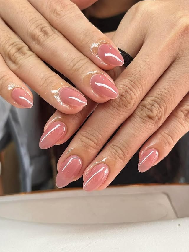 3. Sheer Pink Short Almond Nails - soft pink nail ideas