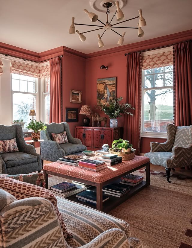 2. Warm Terracotta Red Living Room with Traditional Charm - red living room ideas