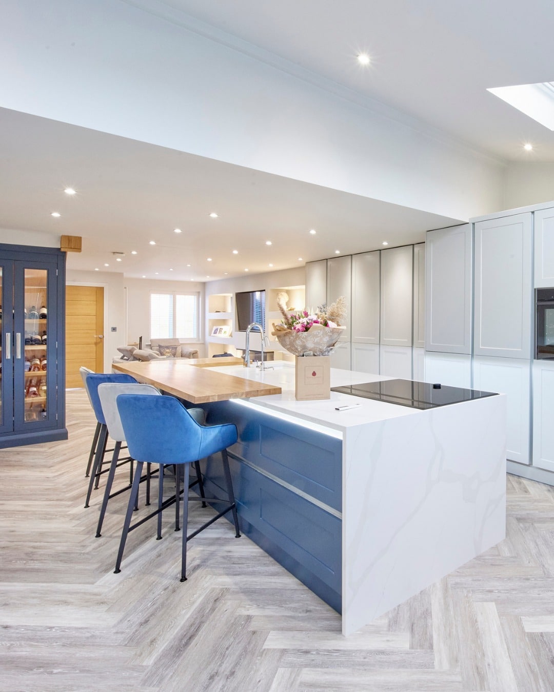 3. Contemporary Blue Base with Streamlined Gray Wall Units - blue and gray kitchen ideas