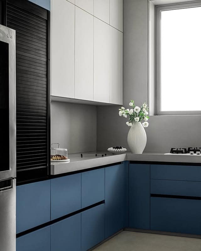 6. Matte Blue Lower Cabinets with Minimalist Gray Uppers - blue and gray kitchen ideas