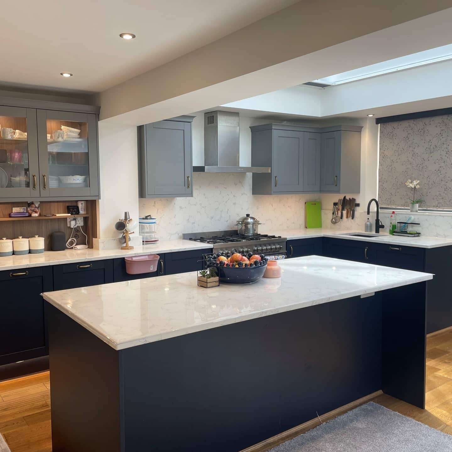 7. Navy and Gray Kitchen with Statement Marble Island - blue and gray kitchen ideas