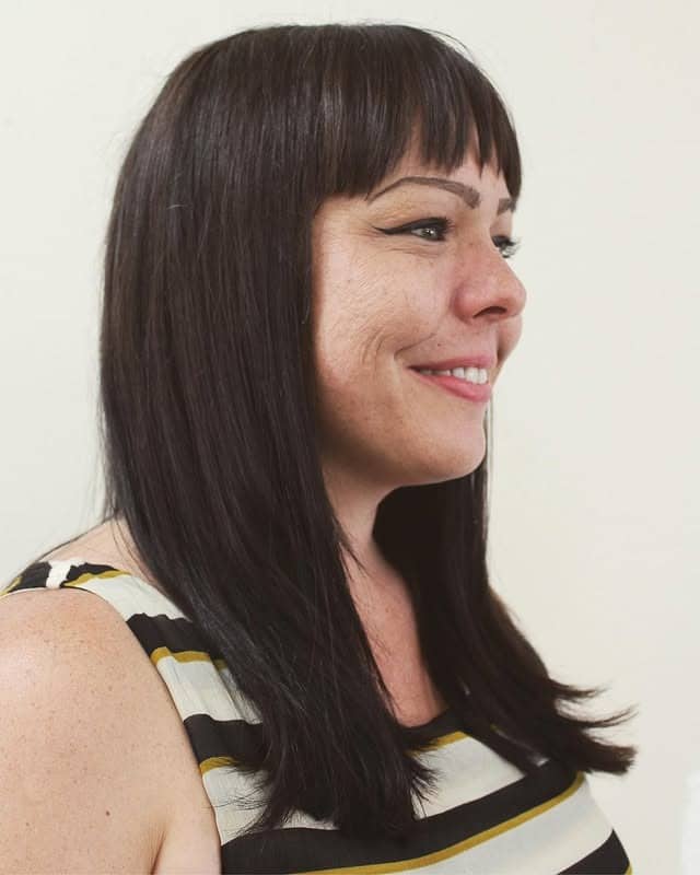 2. Sleek Long Layers with Full Fringe in Deep Brunette - Straight Wispy Hair