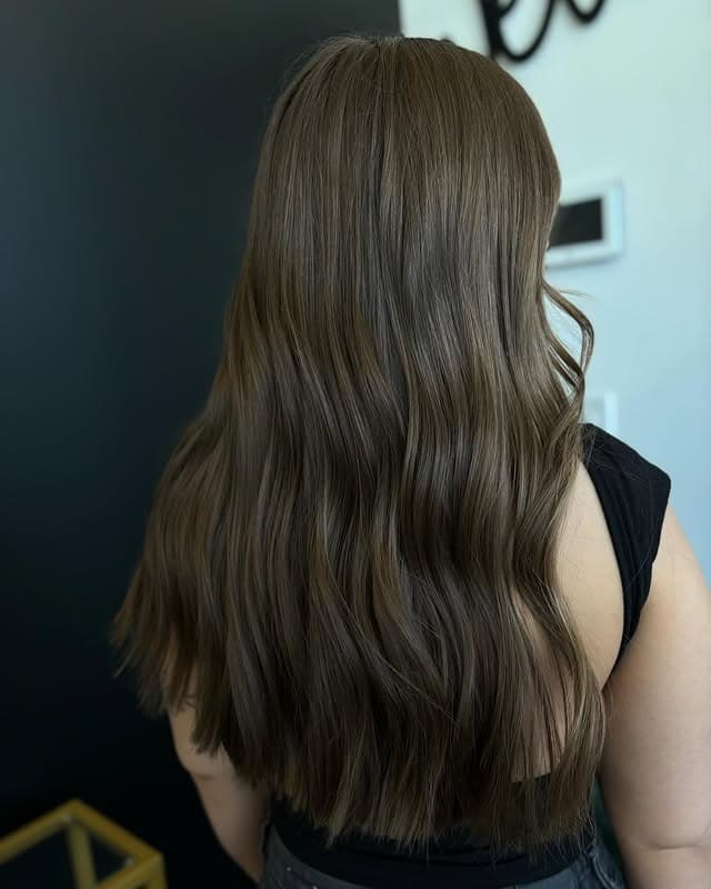 7. Long Natural Layers in Cool Brunette - Straight Wispy Hair