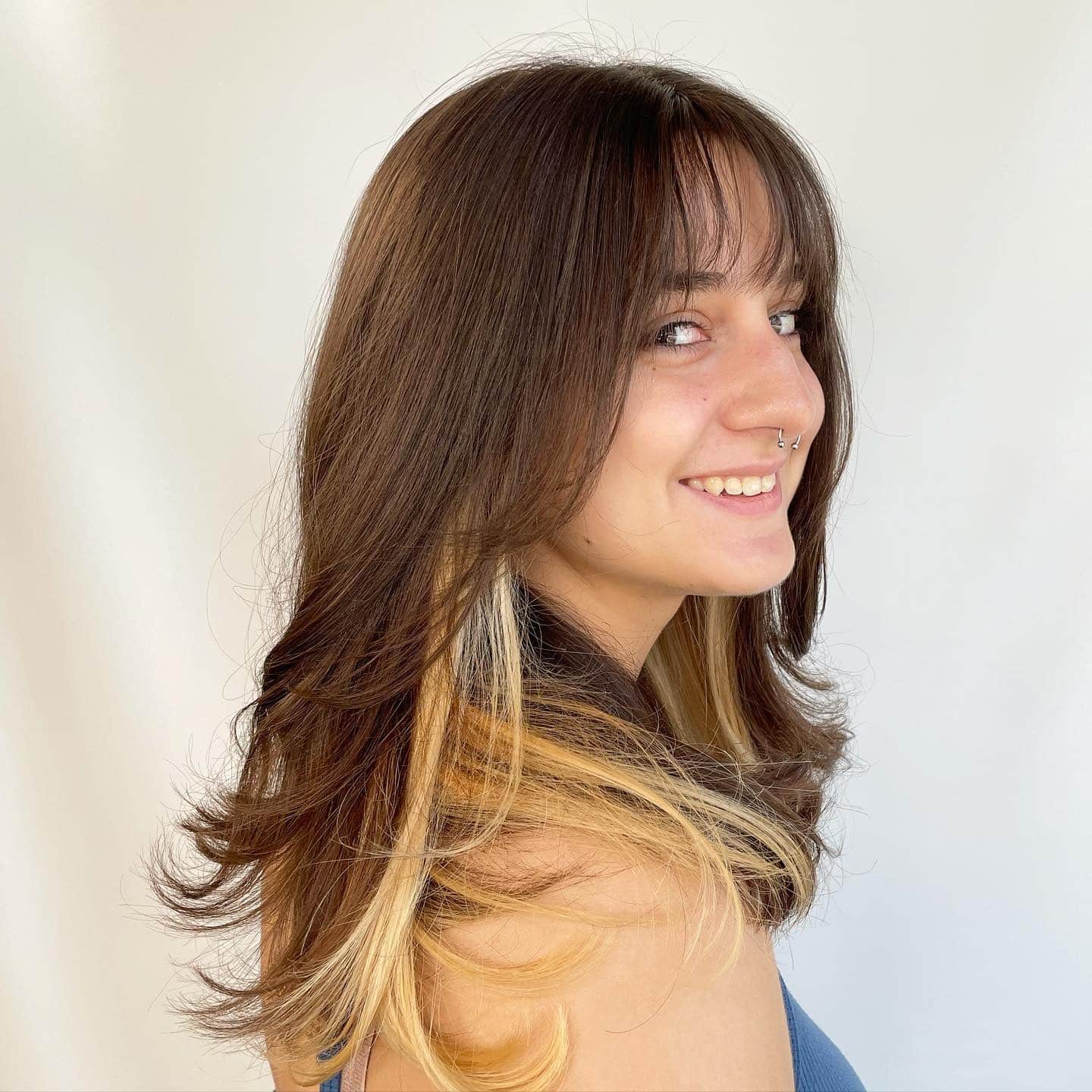 14. Layered Shag-Inspired Cut with Face-Framing Blonde Panels - Straight Wispy Hair