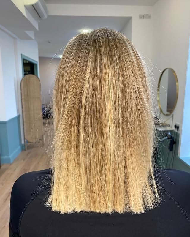 20. Blunt Mid-Length Cut with Warm Golden Blonde Finish - Straight Wispy Hair