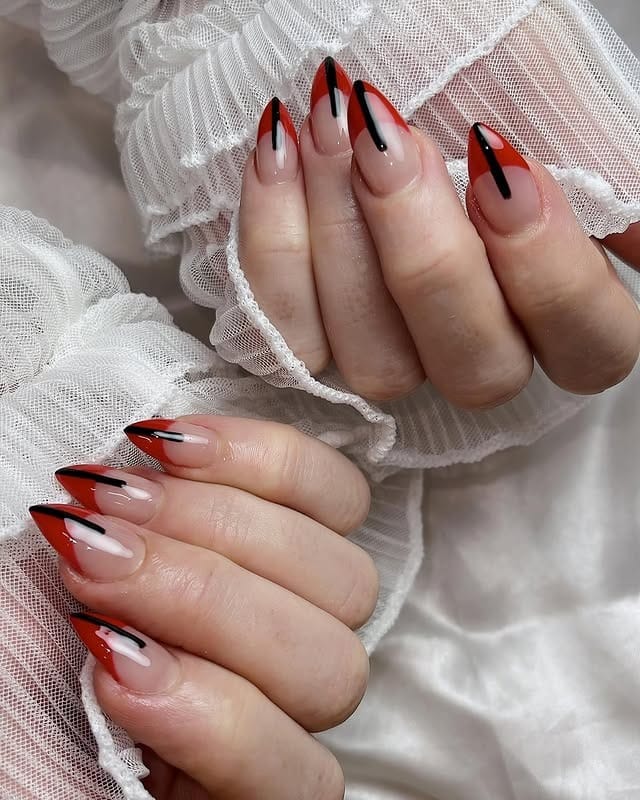 5. Red and Black Abstract French Stiletto Nails - sophisticated nail ideas