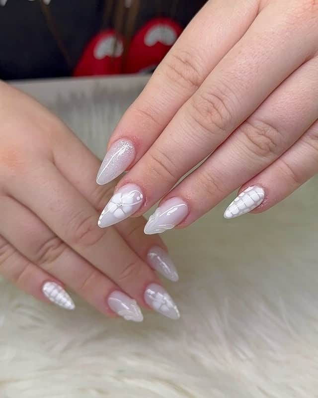 11. Textured White Embossed Almond Nails - sophisticated nail ideas