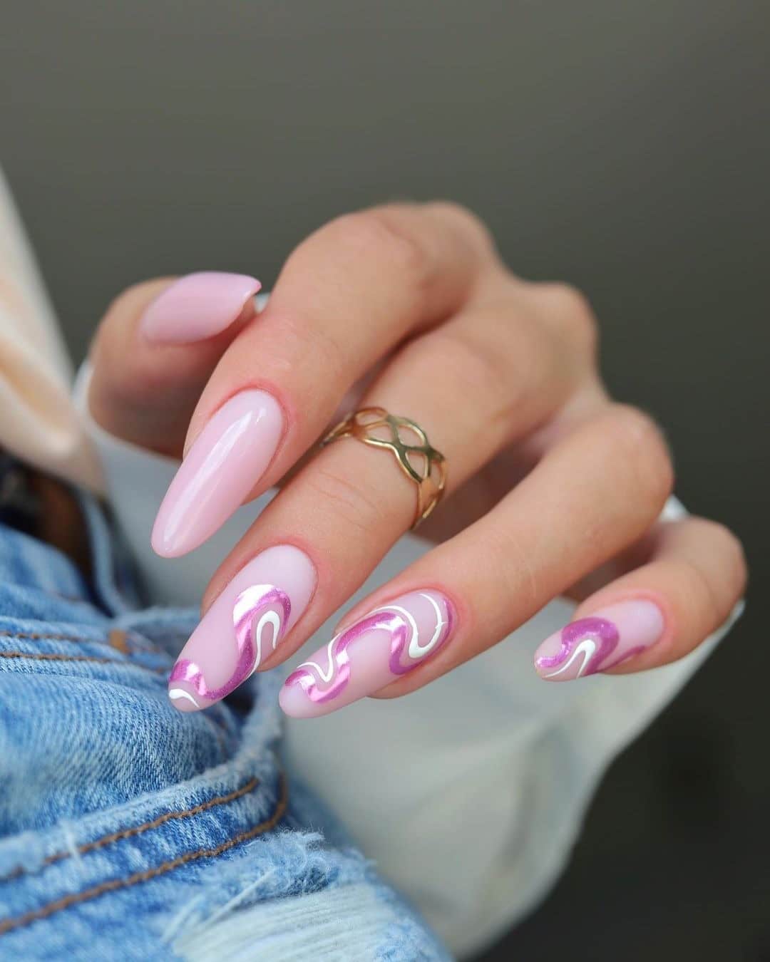12. Pink Swirl French Almond Nails with Metallic Accents - sophisticated nail ideas