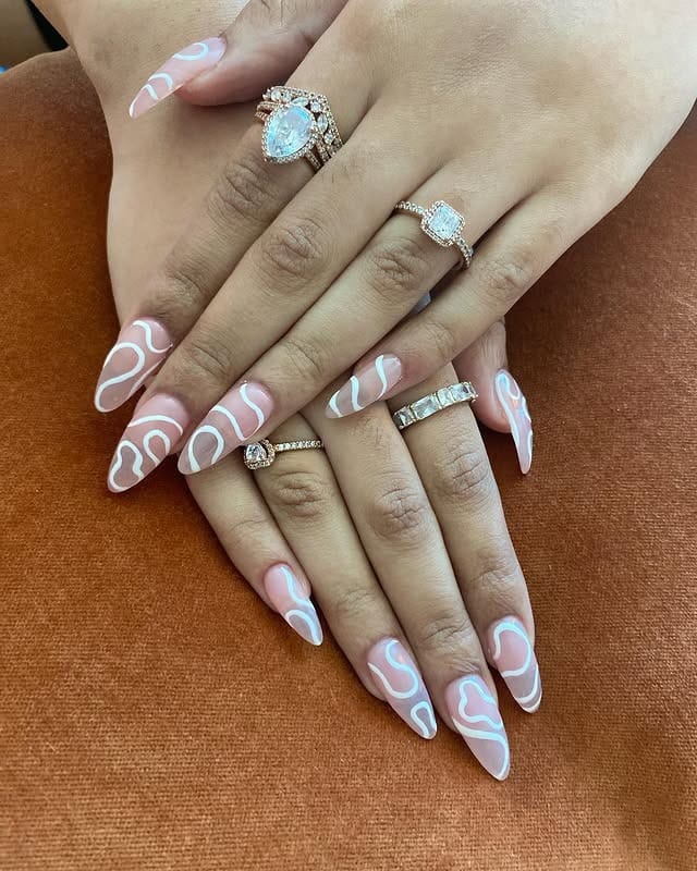1. Soft Pink Almond Nails with White Squiggle Lines - squiggle nail ideas