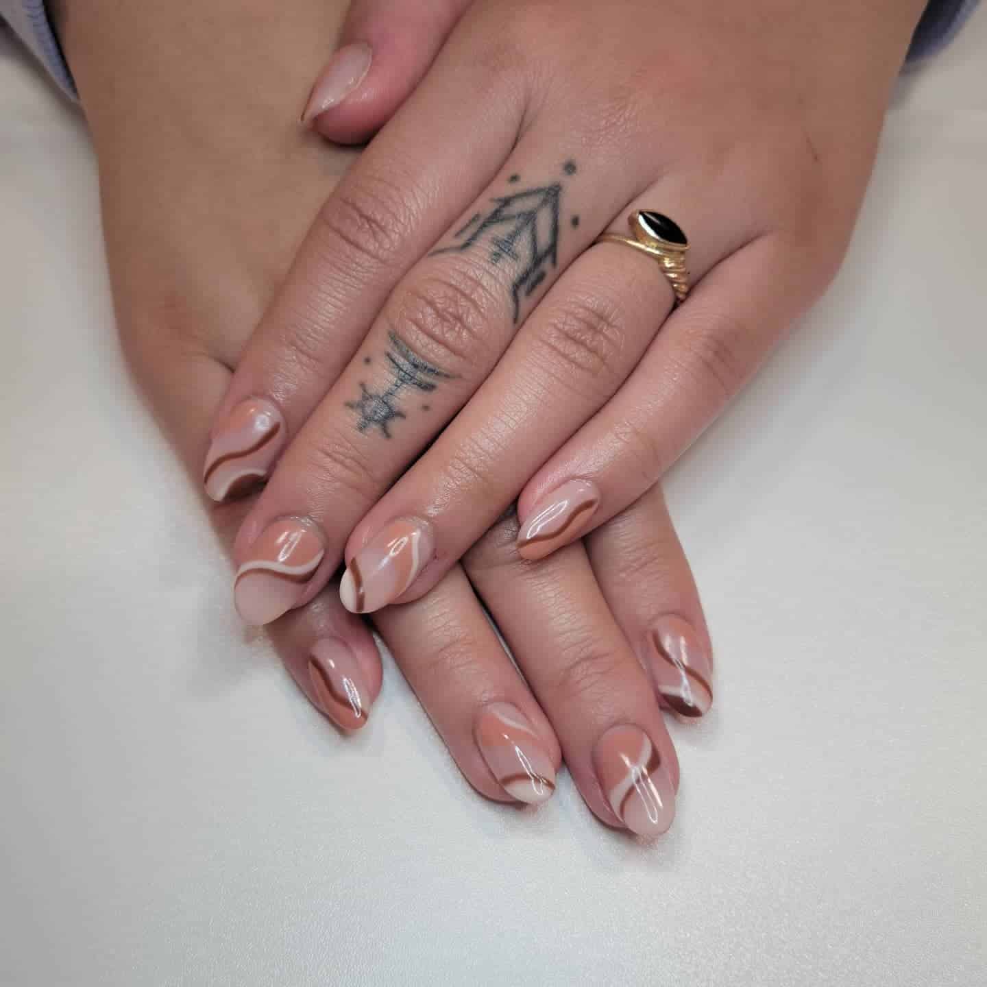 13. Neutral Almond Nails with Cocoa and Cream Squiggles - squiggle nail ideas
