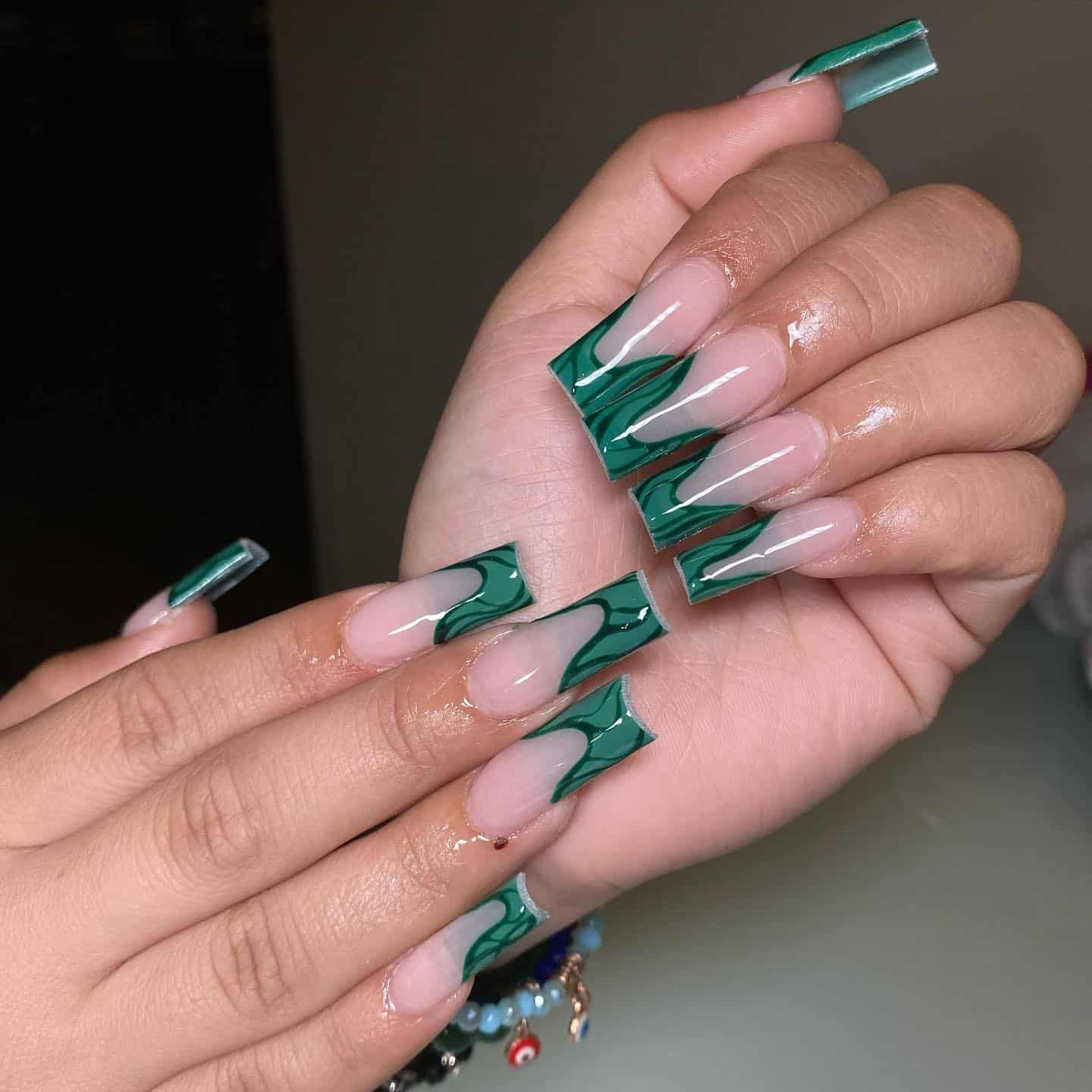 19. Long Square Nude Nails with Deep Green Squiggle Tips - squiggle nail ideas