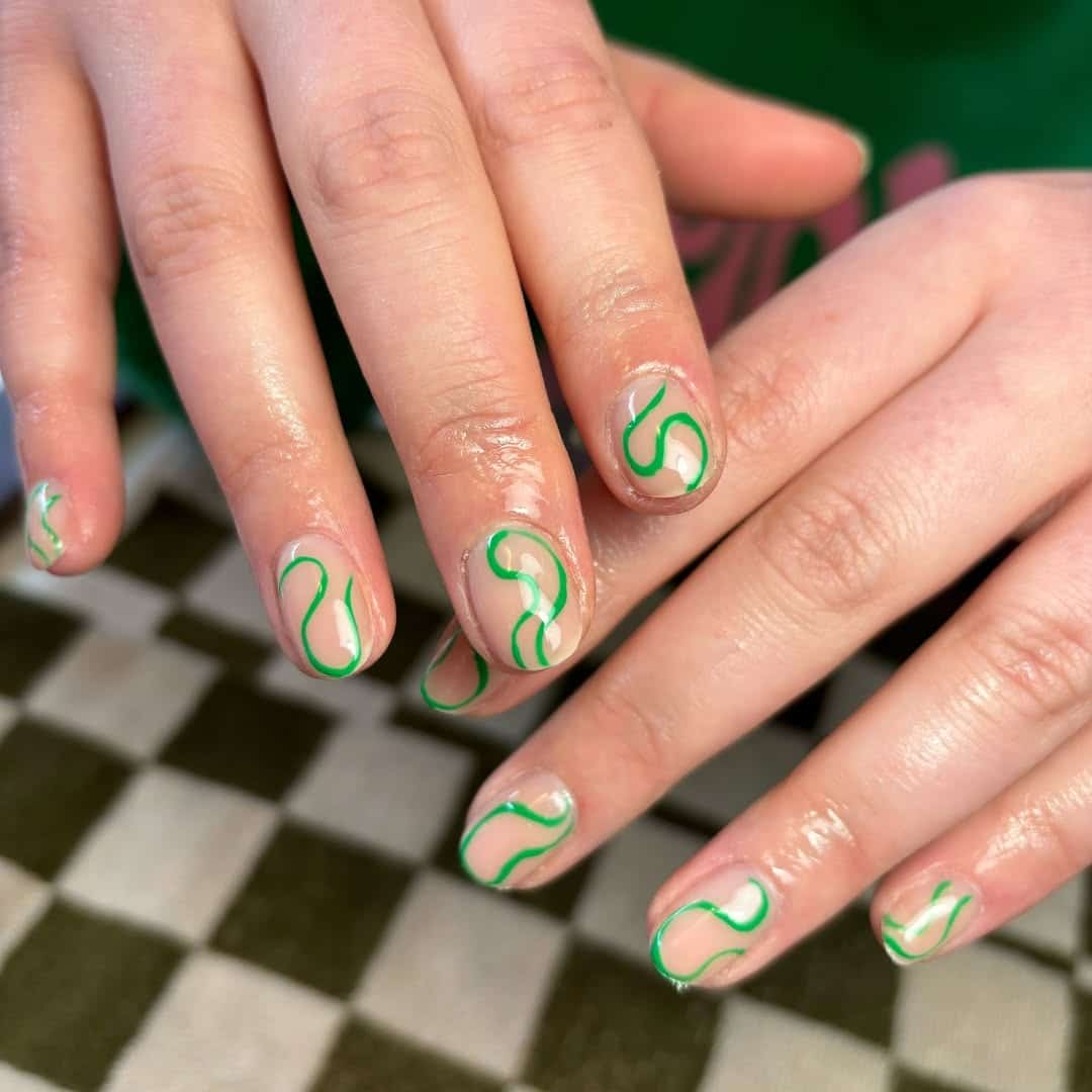 22. Short Nude Nails with Green Minimal Squiggle Accents - squiggle nail ideas