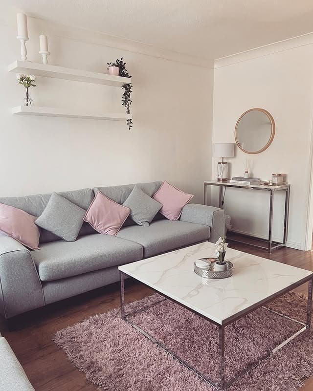 2. Minimalist Grey Base with Pale Pink Highlights - pink and grey living room ideas