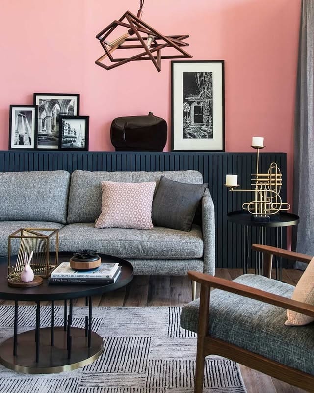 13. Statement Pink Wall with Modern Grey Seating - pink and grey living room ideas