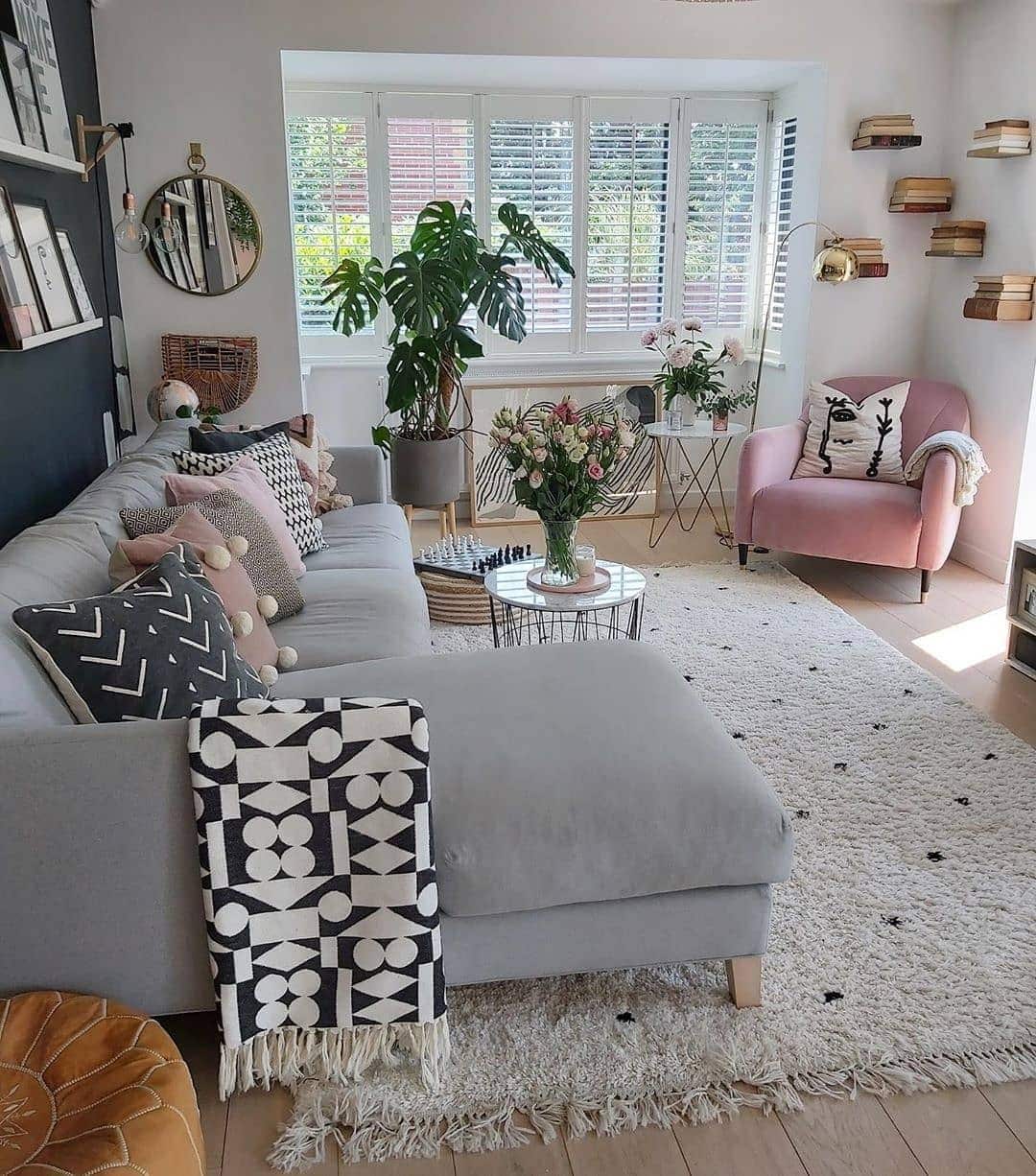 15. Scandinavian Grey Sofa with Playful Pink Details - pink and grey living room ideas