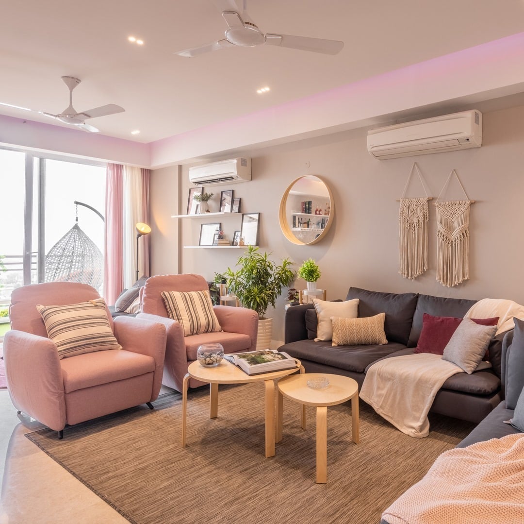 22. Warm Blush and Grey Living Room with Natural Textures - pink and grey living room ideas