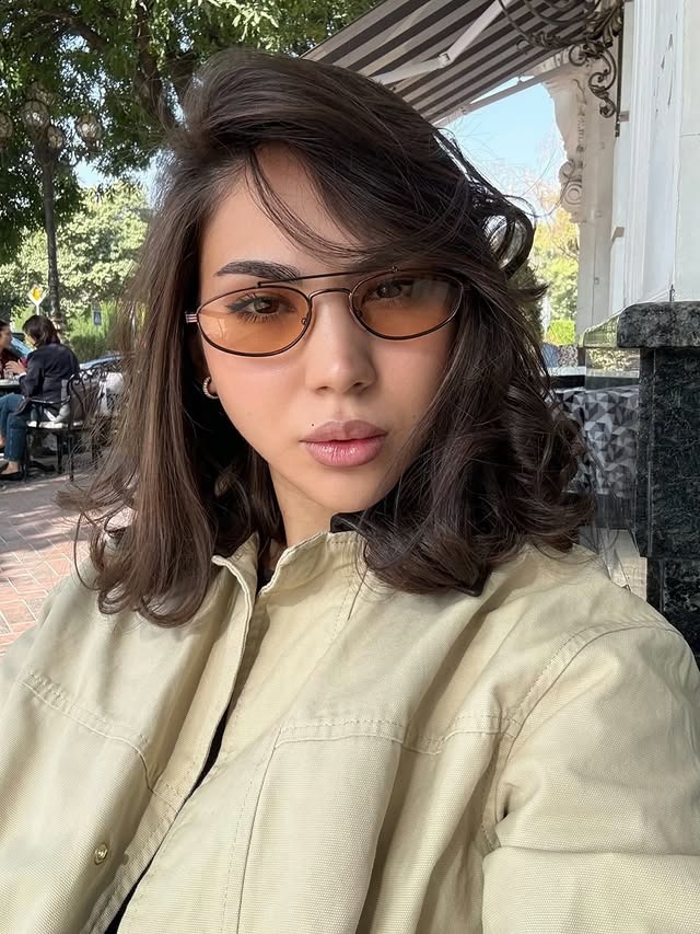 2. Voluminous Layered Brunette with Caramel Tones - Short Fluffy Hair