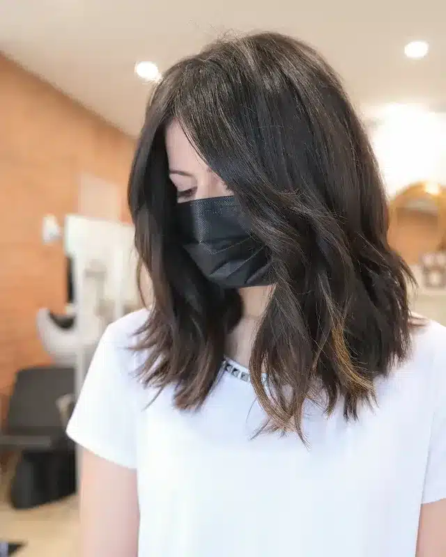 6. Textured Wavy Brunette Lob with Balayage - Short Fluffy Hair