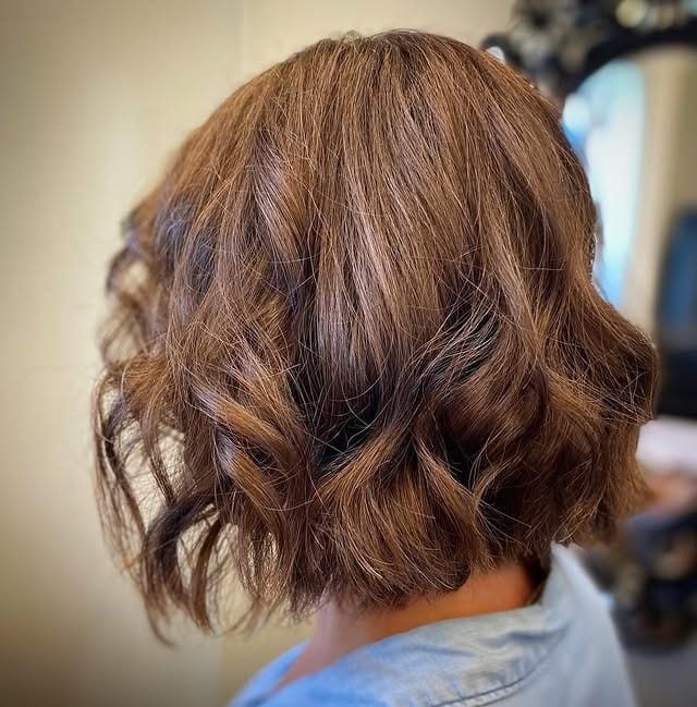 9. Textured Warm Brown Wavy Bob - Short Fluffy Hair