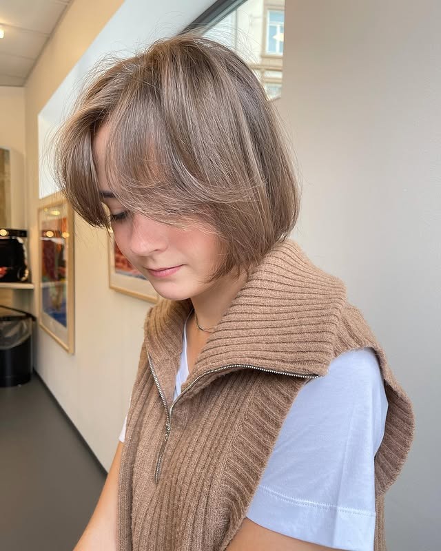 13. Airy Ash Brown Layered Bob with Curtain Fringe - Short Fluffy Hair