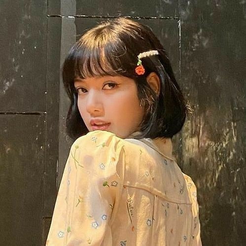 18. Classic Short Black Bob with Micro Bangs - Short Fluffy Hair