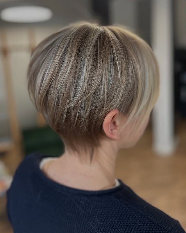 19. Tapered Ash Blonde Pixie with Layered Crown - Short Fluffy Hair