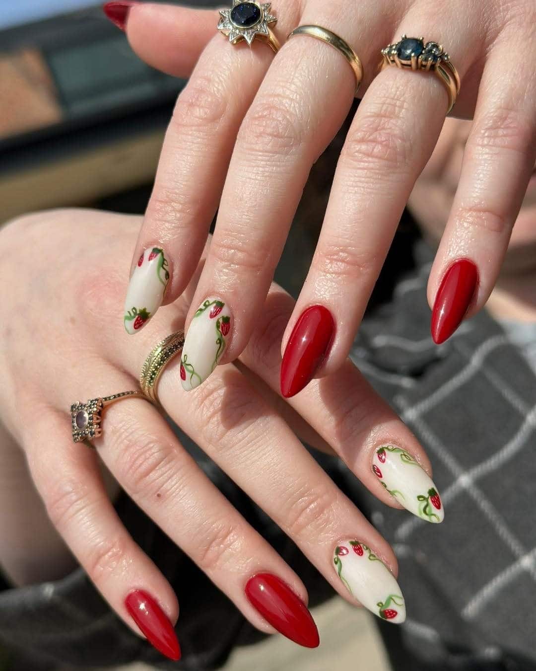 1. Classic Red Almond Nails with Strawberry Vine Art - strawberry nail ideas