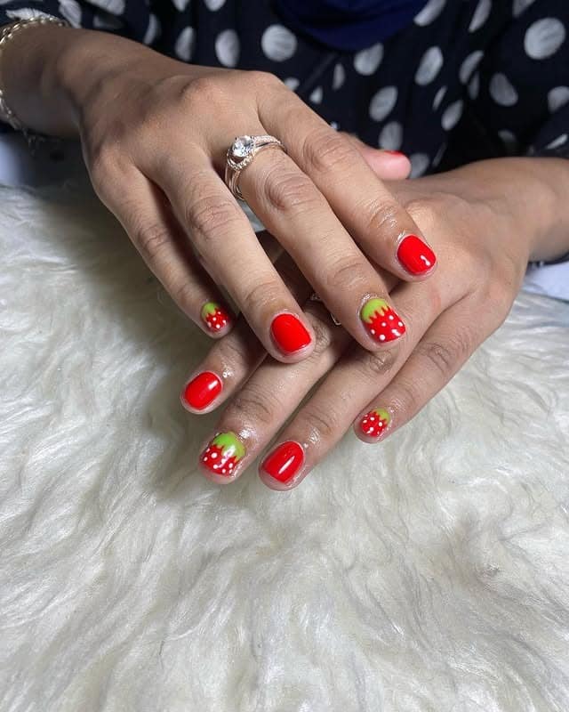13. Short Red Strawberry Tip Nails with Green Drip Detail - strawberry nail ideas