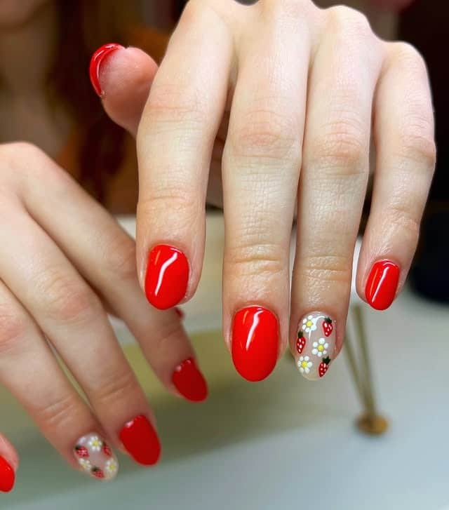 20. Glossy Red Short Nails with Strawberry Accent Detail - strawberry nail ideas