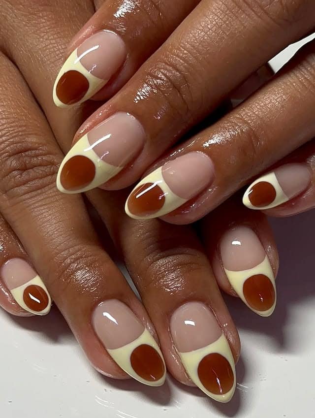 5. Retro Brown & Cream Oval French Tips - summer oval nail ideas