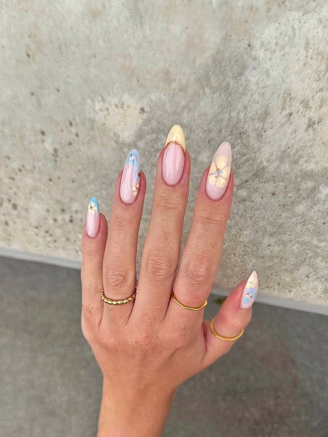 7. Pastel Floral Tip Oval Nails - summer oval nail ideas