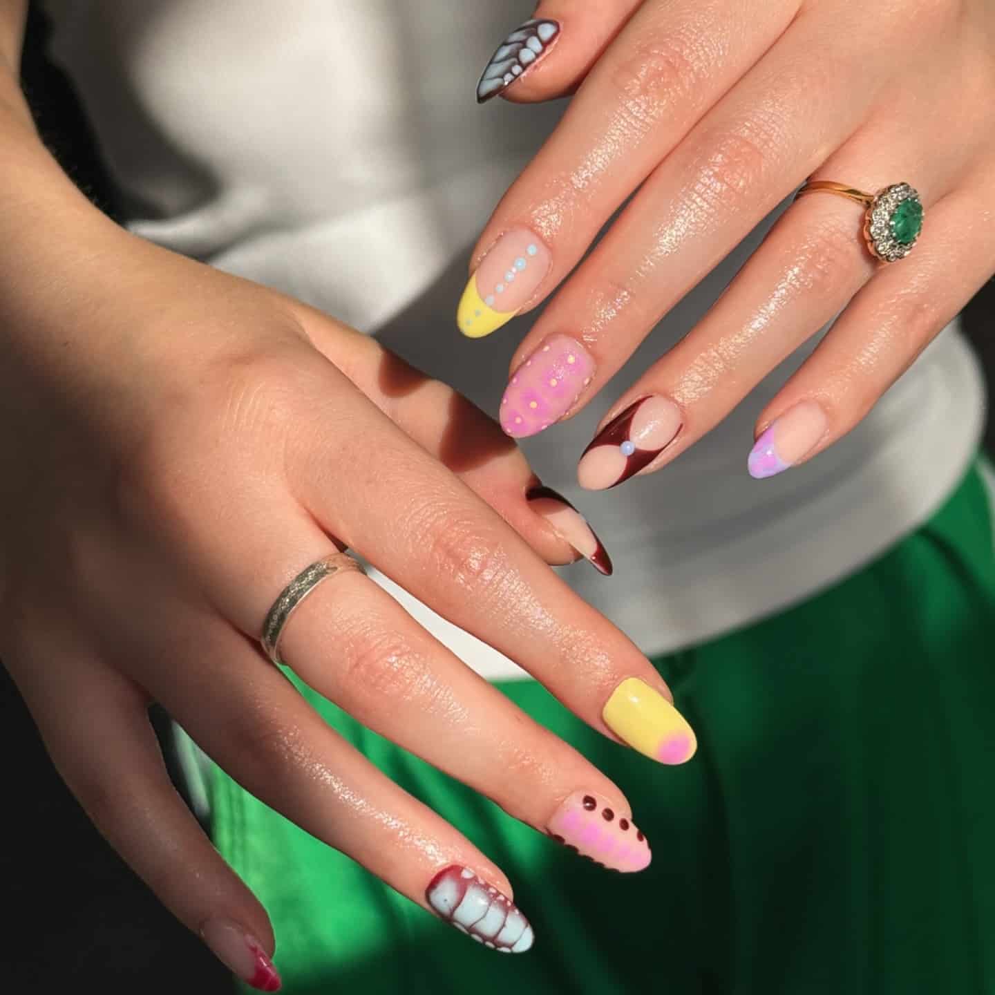 12. Mixed Pastel Art Oval Nails with Graphic Accents - summer oval nail ideas