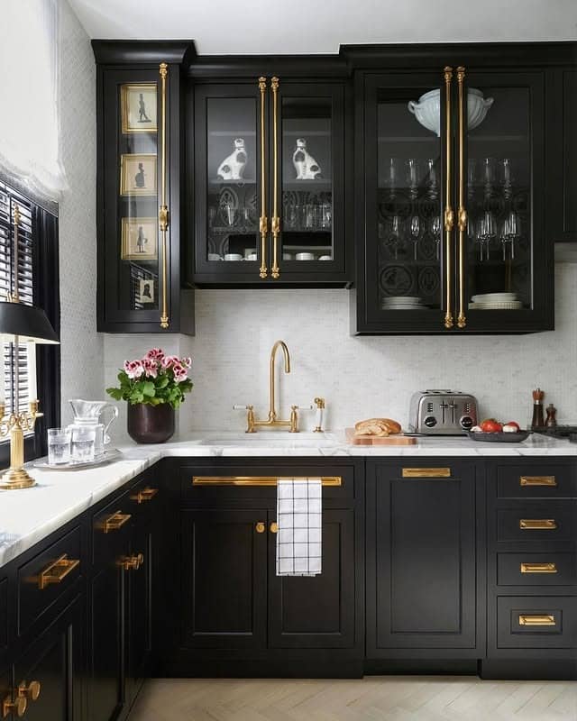 6. Elegant Black Cabinetry with Gold Hardware Accents - black and white kitchen ideas