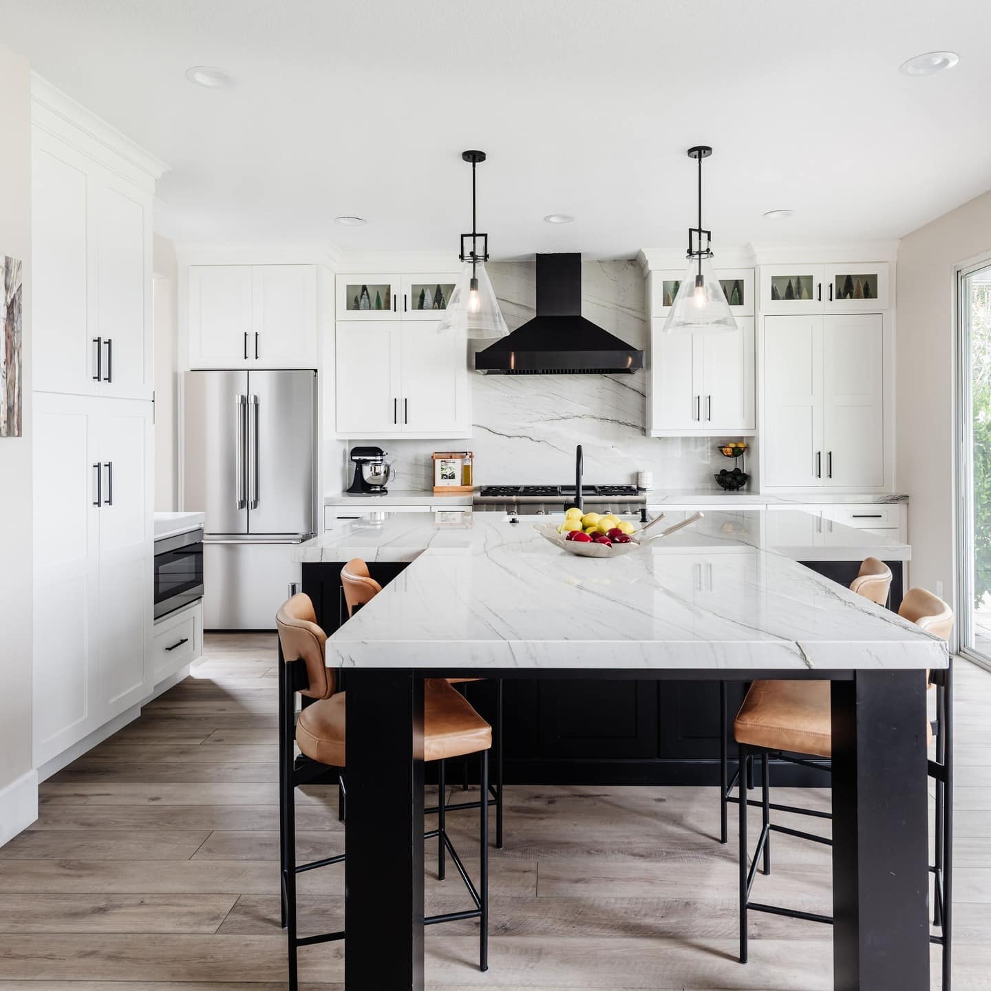 7. Contemporary White Kitchen with Black Base Island - black and white kitchen ideas
