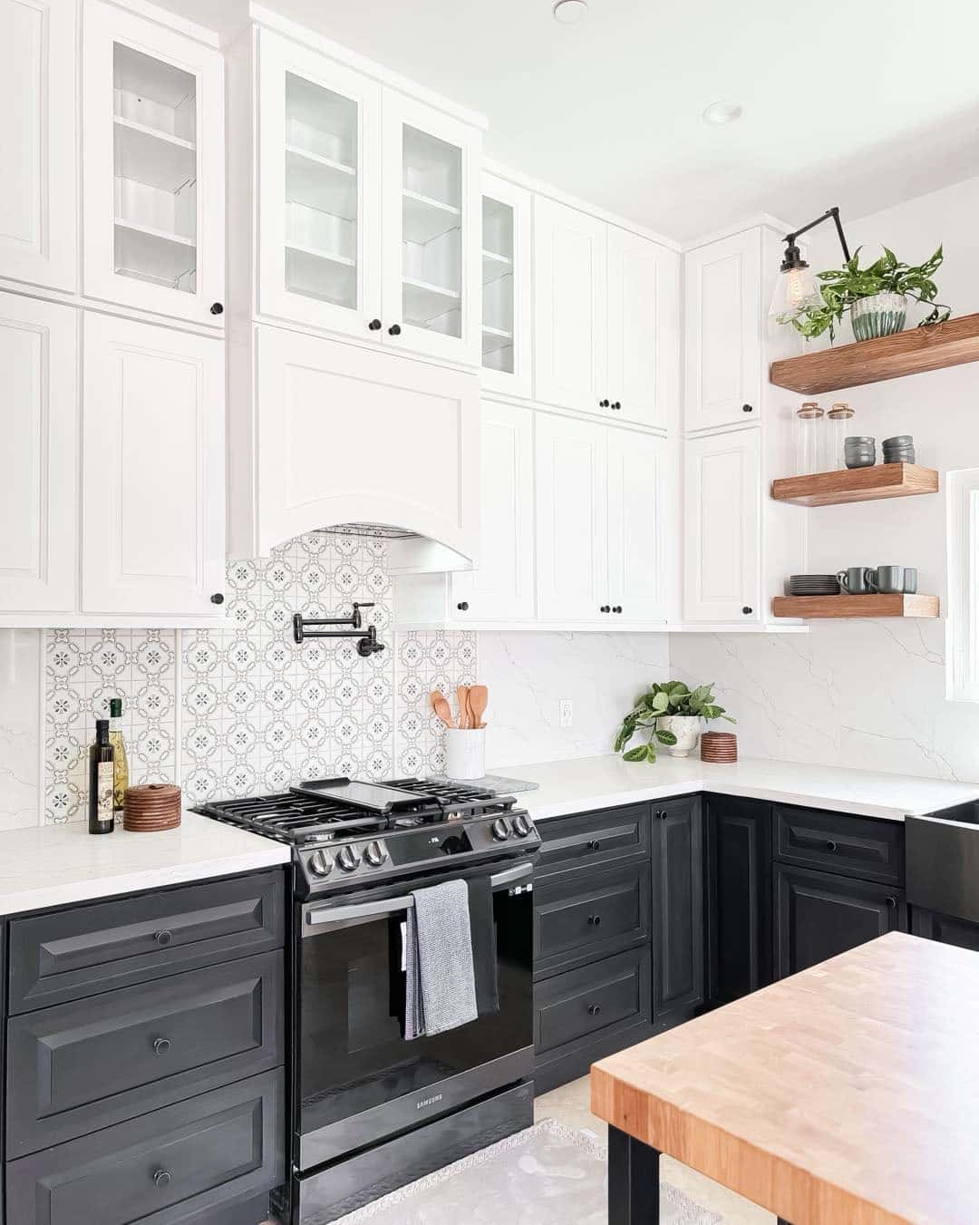 14. Two-Tone Kitchen with White Upper Cabinets and Charcoal Base - black and white kitchen ideas