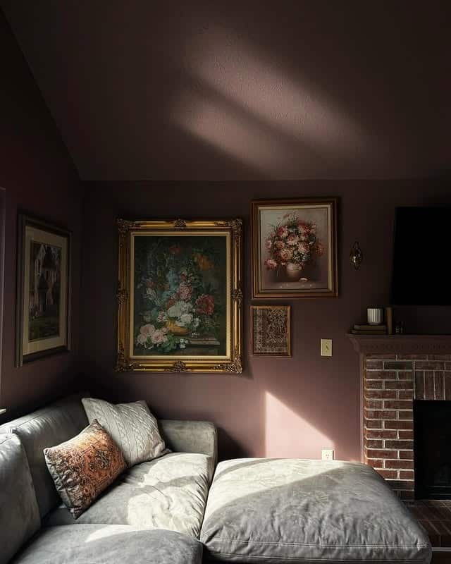 21. Moody Plum Living Room with Gallery Wall Accents - purple living room ideas